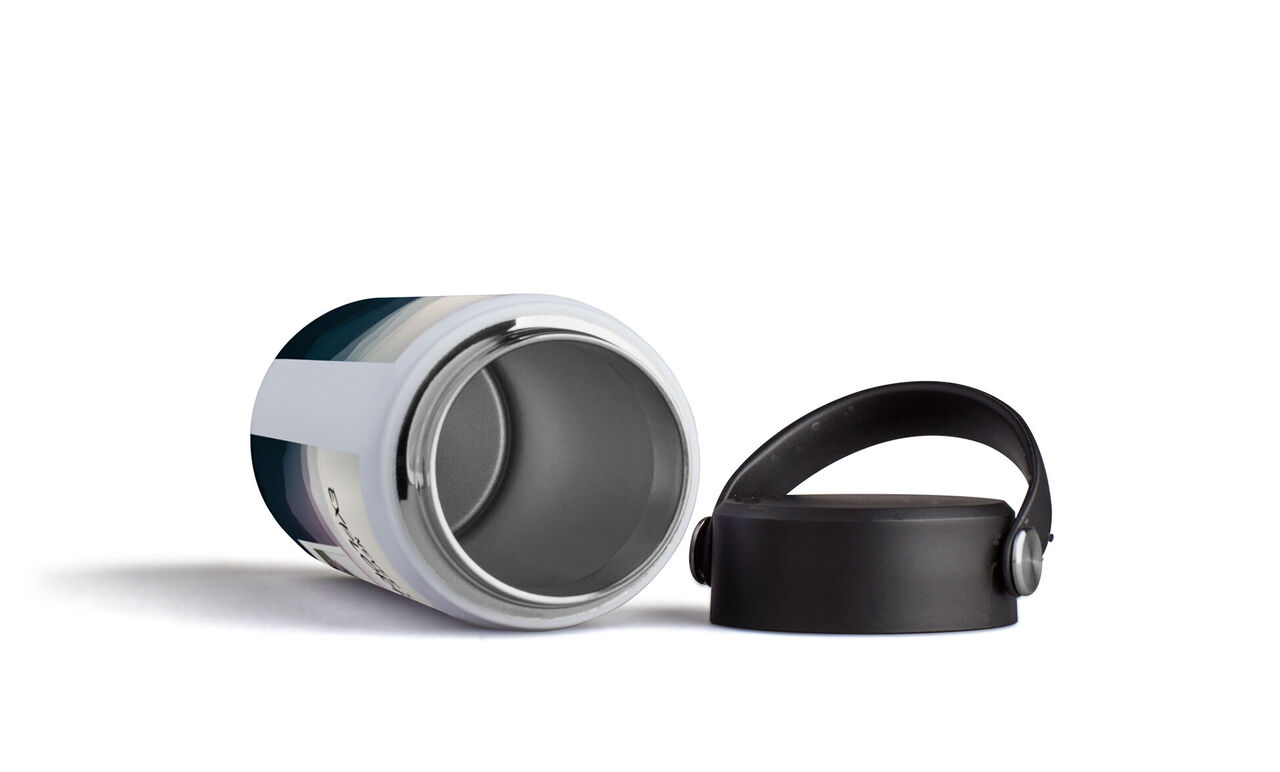 Thermos classique avec design unique pour boissons chaudes.