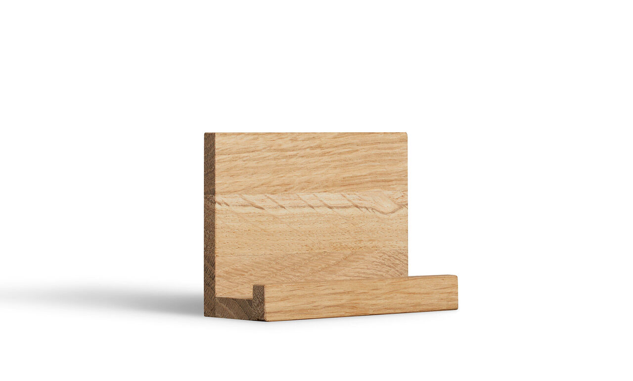 Un support en bois élégant et simple, idéal pour les photos ou petites œuvres d'art