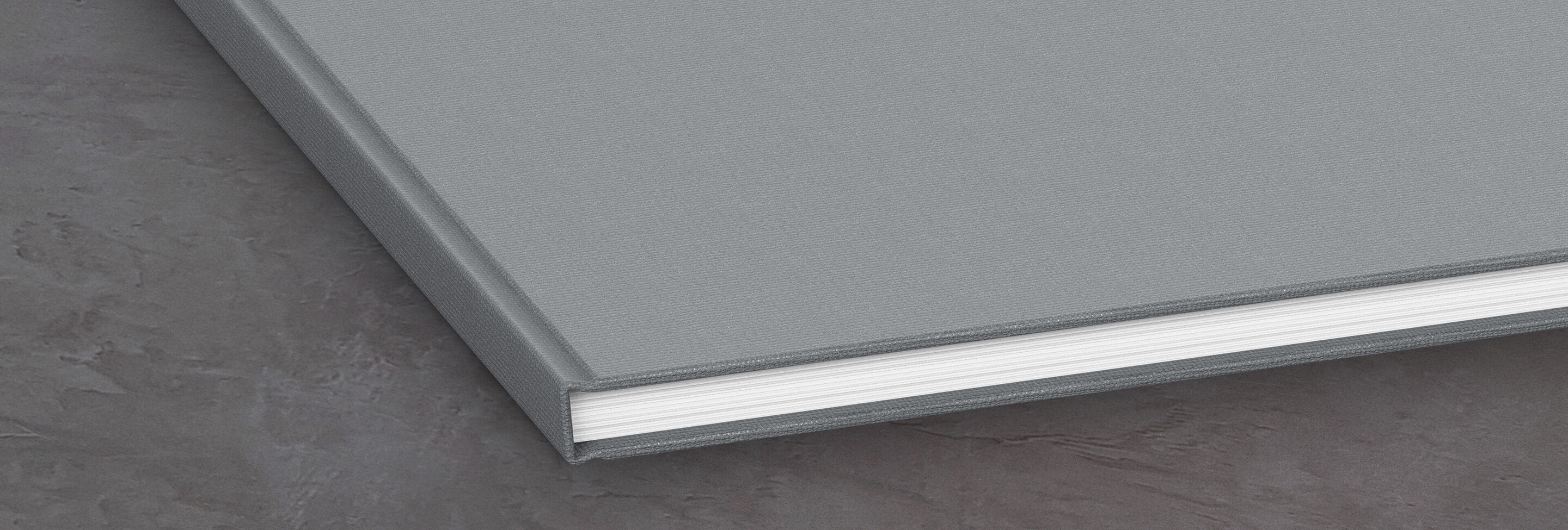 Album photo gris avec des pages blanches, design créatif