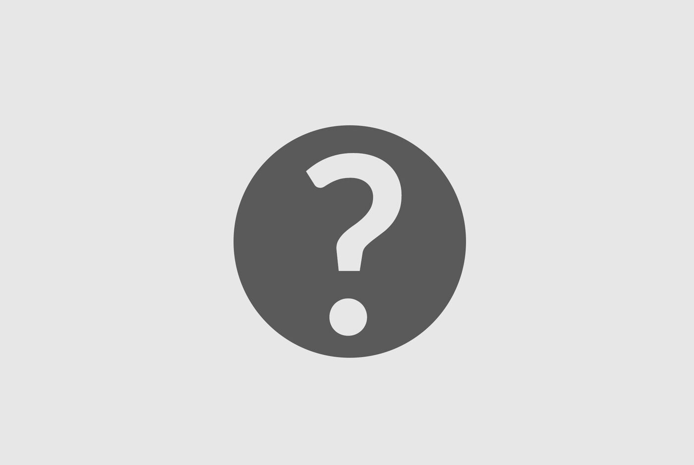 Point d'interrogation dans un cercle sur fond gris